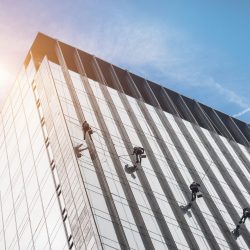 The cleaner in a clean glass building